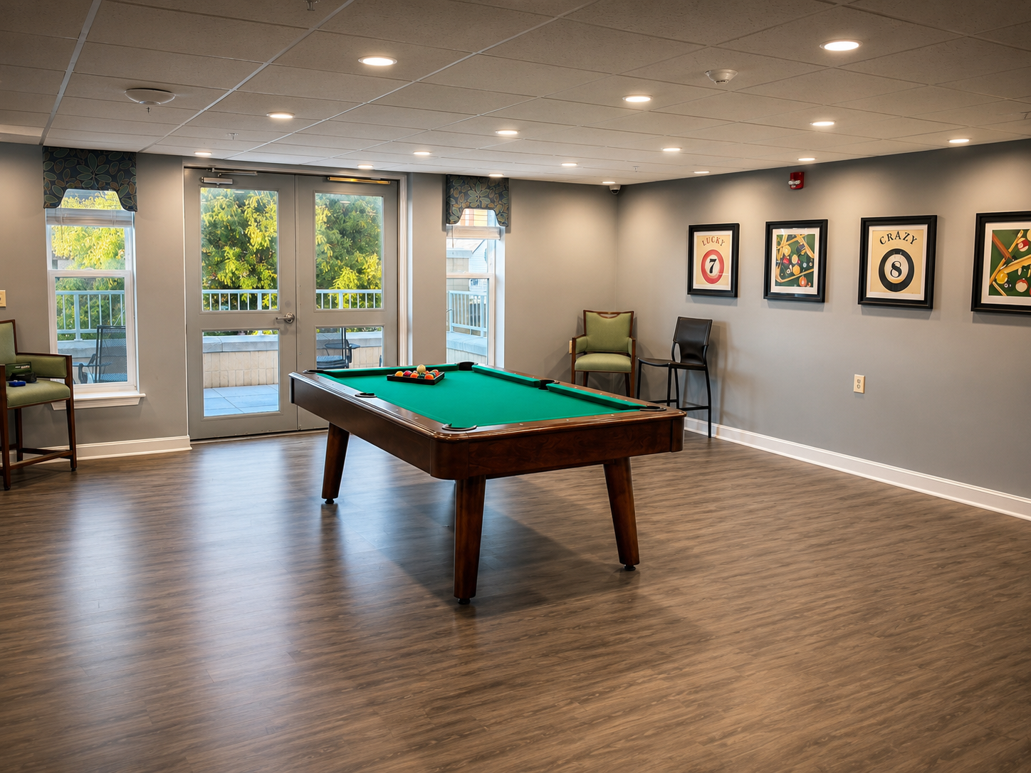 Weinberg House recreation room with recessed lighting and pool table